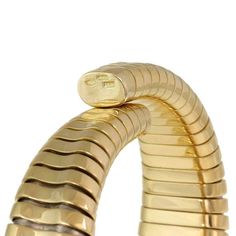 "This is a gorgeous large cuff bracelet, it is crafted from 18k yellow gold featuring a wide front set with sparkling diamonds, all with a total weight of 70 points. The bracelet is in the tubogas design and flex open to allow easy access around the hand. It has the 18k metal content stamp. Material: 18k yellow gold Diamonds: 0.70 total carat weight Color: G-H Clarity: VS1 Measurements: 6.5-7\" x 0.85\" wide x 0.40\" thick Weight: 79.7 grams Stock# 64691" Large Cuff Bracelet, Gold Cocktail Ring, Perfect Figure, Gold Cocktail, Mesh Bracelet, Gold Snake, Vintage Diamond, Sparkle Diamonds, Easy Access