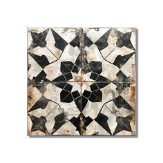 an artistic tile design with black and white tiles on it's sides, in the shape of abstract shapes