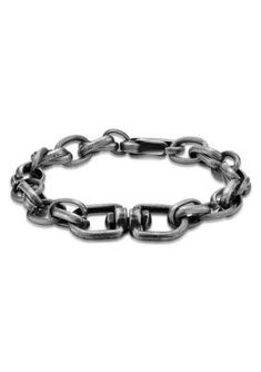 Introducing our Antique Black Ion Plated Stainless Steel Cable Bracelet, a must-have accessory for the modern millennial man. Made with quality stainless steel, this vintage-inspired piece is designed to catch attention and evoke a sense of nostalgia. The unique cable detailing adds a touch of contemporary style, while the antique black finish ensures a bold and edgy look. And with the convenient latch closure, it's easy to put on and take off. Perfect for special occasions or daily wear. | Belk Classic Black Bracelets With Oxidized Finish, Modern Gunmetal Jewelry With Stainless Steel Clasp, Classic Metal Bracelets With Oxidized Finish, Black Metal Chain Bracelet With Oxidized Finish, Classic Stainless Steel Jewelry In Gunmetal, Black Oxidized Metal Chain Bracelet, Modern Gunmetal Chain Bracelet With Solid Link Construction, Modern Gunmetal Link Bracelets, Classic Stainless Steel Bracelets In Gunmetal