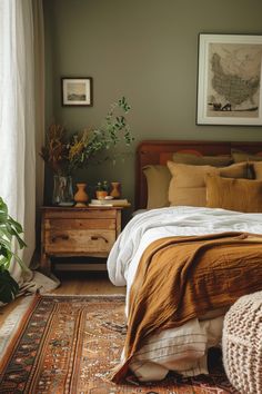 a bedroom with a bed, dresser and rug