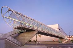 a bridge that has a glass walkway over it