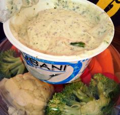 broccoli, cauliflower and carrots in a bowl