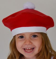 Christmas Hat Red and White Festive French Beret with Pompom Celebrate the Holidays or anytime. For both boys and girls. Babies, Toddlers, Children This hat is made from a soft fleece. The band is stretchy for a comfortable fit. This hat is available in the following sizes: X Small-Newborn-3mo.(15 inches circumference) Small-4-24 mo. (16 1/2 in.) Medium-2T-3T (18 - 19 in.) and Large- 4-9 Years (20 - 21 in.) It is easier to fit the hat to the child if you measure the child's head where the hat is Kids Fleece Hats, Christmas Beanie, Fleece Patterns, French Beret, Kids Beanies, Kids Fleece, Fleece Hat, Outer Wear, Christmas Hat