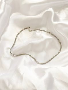 Simple Silver Flat Snake Chain. Great for layering up. Made of Non rust Stainless Steel Ensure to measure neck with measuring tape in inches. (You may want to leave a little extra room so your necklace is not too tight) Please select your length you would like you choker to be at checkout. Made from Stainless Steel, lead free, nicked free. Silver Curb Chain Choker Necklace, Silver Choker Necklace With Curb Chain, Silver Choker Chain Necklace For Everyday, Everyday Silver Chain Choker Necklace, Everyday Silver Choker Chain Necklace, Metal Box Chain Choker Necklace, Everyday Silver Clavicle Chain Choker, Minimalist Snake Chain Choker, Silver Snake Chain Choker