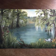 an oil painting of a lake surrounded by trees