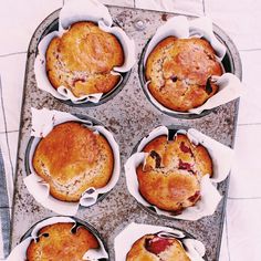 six muffins sitting on top of a metal pan