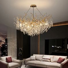 a living room with couches and a chandelier in the middle of it