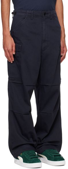 Relaxed-fit straight-leg cotton-blend twill cargo pants. · Mid-rise · Belt loops · Four-pocket styling · Zip-fly · Cargo pocket at outseams · Cinch tabs at back waist · Graphic patch at back pocket Supplier color: Anthracite night Levi's Straight Leg Pants With Pockets, Navy Straight Leg Cargo Pants, Baggy Cargo Pants With Patch Pockets For Work, Navy Relaxed Fit Pants With Side Pockets, Navy Straight Leg Pants With Pockets, Baggy Navy Bottoms With Pockets, Levi's Utility Cargo Pants With Pockets, Levi's Cotton Bottoms With Patch Pockets, Levi's Straight Leg Pants With Belt Loops