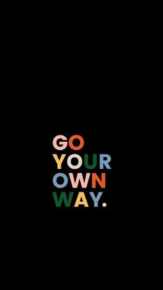 the words go your own way written in multicolored letters on a black background