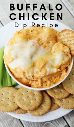 buffalo chicken dip recipe on a plate with crackers and celery next to it