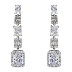 Step into a world of glamour with the Crawford Drop Earrings in Silver White. Exquisitely fashioned  and resplendent with dazzling simulated diamonds, these earrings exude an Art Deco charm that’s both vintage and timeless.  The elegant drop design features five rectangular settings. Each setting is graced with a unique arrangement of gemstones, crowned by a single radiant simulated diamond at the bottom, encircled by a stunning array of baguette-cut stones.   These earrings are designed for bot Luxury Crystal Chandelier Earrings For Formal Occasions, Silver Cubic Zirconia Earrings For Glamorous Events, Luxury Cubic Zirconia Bridal Earrings For Pierced Ears, Luxury Crystal Earrings With Diamond Accents, Luxury Bridal Drop Earrings With Sparkling Stones, Luxury Bridal Dangle Earrings With Sparkling Stones, Luxury White Gold Crystal Earrings For Formal Occasions, Glamorous Drop Earrings With Brilliant Cut, Glamorous Brilliant Cut Drop Earrings