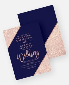 two wedding cards with gold foil lettering on the front and back, against a navy blue background