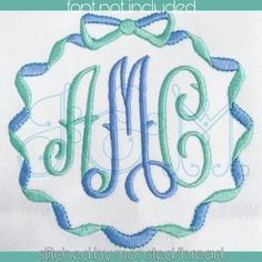 an embroidered monogrammed shirt with the letter m in blue and green on it