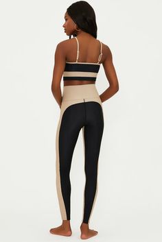 The Colorblocked Leggings is our high-waisted ribbed legging. This legging has the same rise as our best selling Piper and Ayla Legging. This ultra-soft black ribbed fabric features a tan panels along the side and on the inside. Pair it with our matching Eva Top to or our Leah top in tan or black to make it a workout set. Tasman Slippers Outfits, Slippers Outfit, Hairstyles With Glasses, Gaucho Pants, European Summer Outfits, Color Block Leggings, Dress Halloween Costume, Ribbed Leggings, A Workout