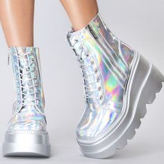 Lasr Exclusive Radio Chromatica Silver Platform Boots - 3" Platform, 2” Platform - Vegan Leather Upper - Holographic Silver Detail Contrast - Easy Slip-On And Lace Upfront - Cape Robbin Logo - Fully Lined Microfiber Inner - Padded Insole For Comfort - Rubber Sole With Major Traction Platform Sole - Metal Zipper Closure - Silver Hologram Rainbow Platform Shoes, Metallic Rave Outfits, Warframe 1999, Hologram Outfit, Neon Apartment, Holographic Outfit, Slay Shoes, Holographic Rave Outfit, Holographic Boots