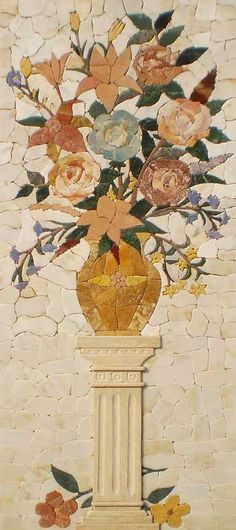 a vase filled with lots of flowers on top of a white table next to a wall