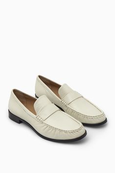 The COS Penny loafers are a reimagined classic. Crafted from supple chrome-free leather, they have almond-shaped toes and low stacked heels. They feature a signature penny strap and tonal topstitching. 100% Leather Jeweled Bag, White Loafers, Loafers Women, Blazer With Jeans, Nude Heels, Designer Heels, Penny Loafers, High Heel Boots, Loafers For Women