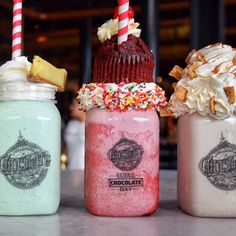 three different types of drinks in mason jars