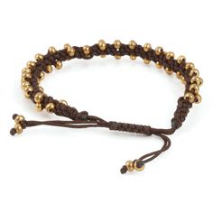 Hand braided bracelet with tiny gold drop beads and slider clasp. Wear this alone, or mix it in with your other everyday favorites for a personalized everyday personal signature piece.length : 6 1/4 - 91/2 inches total width: 1/4 inchtiny 2mm beads : goldthread : chocolate brown cottonfastens with an adjustable cotton cord closureSize: adjustable (fits 5.5 to 8.50 inch wrist)all sizes are approximate Adjustable Gold Friendship Bracelets With Gold Beads, Everyday Braided Bracelets With Round Beads, Adjustable Braided Gold Jewelry, Adjustable Gold Braided Jewelry, Adjustable Braided Gold Bracelets, Adjustable Brown Beaded Bracelets, Adjustable Brown Jewelry For Friendship, Adjustable Gold Beads Friendship Bracelets, Adjustable Gold Braided Bracelet With Round Beads