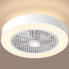 a bathroom exhaust fan with light on the ceiling