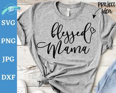 a t - shirt with the words blessed mama on it and an image of a pair of jeans