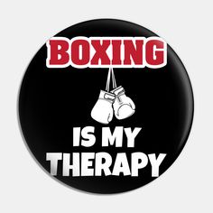 a black button with boxing is my therapy