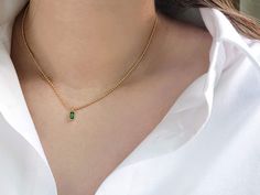 "* Emerald Gemstone Necklace * Our Emerald Gemstone Necklace is shiny and elegant. This is nice for anyone born in May or who loves emerald and green birthstone. This made with high quality 18K gold plated material, the cheerful color and diamond cut gemstone coordinate effortlessly with any outfit.  Wear it on its own or layer it up, either way this necklace is beautiful. The perfect gift for someone special to show them your never-ending love! ♥ Finish: 18K Gold Plated  Material: Stainless steel Total length: 16\"+2\" Pendant Sizes: ~ 5mm x 6mm Baguette  Package: All jewelry comes in a beautiful box, ready for gifts. Category: Rectangular Birthstone Necklace Daily, Friendship Necklace, Charm Necklace Gold Vintage Necklace, Gold Necklace Women Gemstone Jewelry, Bridesmaids Necklace Emeral Everyday Elegant Emerald Necklace, Elegant Everyday Emerald Necklace In Gold, Elegant Gold Emerald Necklace For Everyday, Elegant Everyday Gold Emerald Necklace, Everyday Elegant Gold Emerald Necklace, Dainty Green Emerald Necklace For Formal Occasions, Emerald Pendant Necklace, Rose Gold Choker, Diamond Necklace Wedding