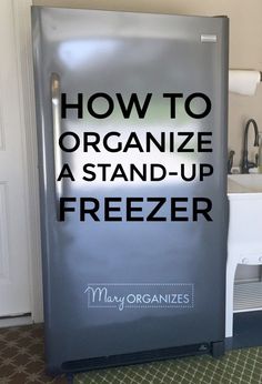 a refrigerator with the words how to organize a stand - up freezer on it