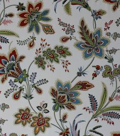 a floral wallpaper with many different colors and designs on it's surface,