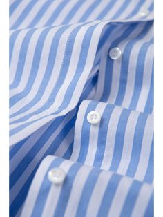 Details: Refreshing blue and white striped shirt group polo collar design, sharp lines White letters on the chest Loose hem Materials & Care: Cotton 100% Hand wash | Dry clean Do not bleach Size & Fit: Model is 5'7", Bust 32, Waist 24, Hips 35, wearing a size S Item #: WM2DR10 Spring White Shirt With Signature Stripes, White Shirt With Signature Stripes For Spring, Spring White Shirt With Striped Cuffs, White Shirt With Striped Cuffs For Spring, Blue Shirt With Contrast Stripes For Summer, Blue And White Striped Shirt, White Letters, Simple Lighting, Collar Designs