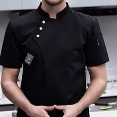 Description: Breathable Material: This chef jacket is made of high quality cotton, soft, skin friendly and sweat absorbing. Simple Design: This unisex chef coat adopts diagonal three buttons collar design, unique and Practical Pocket: There is a little the front of for some small items ,like cards, compact and practical. Short Sleeves: This chef with simple cuffs, loose and comfortable to wear, free movement. Wide Applications: This charming short sleeve shirt is widely suitable for kitchen, res Unique Chef Uniform, Chef Shirt Design, Chef Coat Design, Cooking Clothes, Chef Outfit, Cook Clothes, Chef Shirt