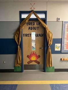 the front door to a classroom with an open fire place and sign above it that says, feed up about first grade