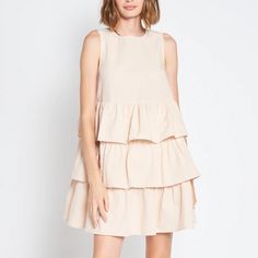 En Saison Is Designed With Attention To Detail And Plays With Feminine Tones Infused With Forward Twist On Classic Silhouettes. Each Style Is Everlasting And Perfectly Aligns With Our Mantra, Always "In Season." 100% Cotton Tiered Mini Dress Model Is 5'9 And Wearing A Size Small Nwt Spring Beige Tiered Dress With Ruffle Hem, Beige Tiered Dress For Brunch, Beige Tiered Dress For Spring, Beige Tiered Dresses For Spring, Beige Tiered Midi Dress For Spring, Spring Sleeveless Midi Dress With Layered Hem, Sleeveless Midi Dress With Layered Hem For Spring, Feminine Layered Hem Mini Dress For Spring, Chic Tiered Beige Dresses