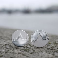 Hand-pierced silver cufflinks, with the distinctive skyline of St Paul's Cathedral. Positive/negative design with matt and polished finishes. Silver, diameter approx 1.9cm. The cufflink mechanism is a classic silver hinged bar fixing, suitable for most shirts. Each pair of cufflinks is handmade to order. I can also do any building you like as a custom order, please just ask. Negative Design, Silver Mountain Ring, St. Paul’s Cathedral, Handmade Cufflinks, Mens Cufflinks, Independent Study, Hand Piercing, Diamond Cufflink, Battersea Power Station