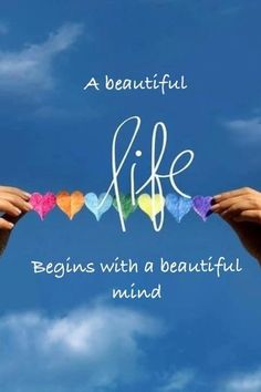 two hands holding hearts with the words life begins with a beautiful mind