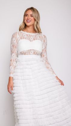 Experience the magic and allure of our Olivia Layered White Lace Tulle Dress, where timeless elegance meets modern romance. Whether you're walking down the aisle, attending a formal event, or celebrating a special occasion, this dress will make you feel like the epitome of grace and beauty. 78747 D8-2 Lace Layered Dress, Lace Tulle Dress, Lace Layers, Layered Dress, Modern Romance, Layer Dress, Walking Down The Aisle, Floral Dress Black, Floral Midi Dress