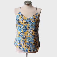 J. Crew - Floral Scalloped Cami - Size 4 Brand New Scalloped Chic Cami Is Brand New Without Tags And Never Worn. The Straps Are Fully Adjustable To Help The Halter Neck Styled Neckline Lay On Your Chest To Your Liking. Full Coverage Chest, With A Beautiful And Chic Outline All Over The Hemlines Of This Top. Blue And Yellow Floral Pattern Double Lined Size 4 Modern / Maximalism Design Feminine Flare Summer And Spring Blouse Dressy Tank Women’s Fashion Please Let Me Know If You Have Any Questions Yellow Floral Print Tank Top For Spring, Summer Yellow Floral Print Tank Top, Yellow Cami Tank Top For Beach, Yellow Spaghetti Strap Tank Top For Vacation, Yellow V-neck Tank Top For Summer, Yellow Camisole Tops For Beach, Yellow Summer Camisole For The Beach, Yellow Cami Tank Top For Day Out, Yellow Summer Camisole For Beach