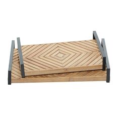 two wooden trays sitting on top of each other with black metal straps around them