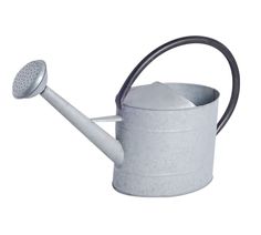 a white watering can with a black handle