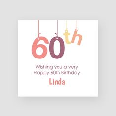 a 30th birthday card with the number 30 hanging from strings