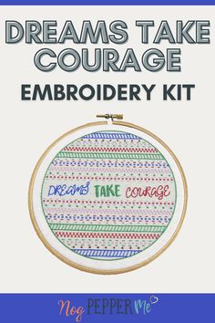 an embroidery kit with the words dreams take courage embroidered on it