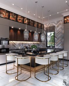 a modern kitchen with marble counter tops and gold accents, along with bar stools