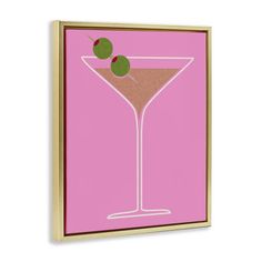 a pink painting with a martini glass and a green olive on the rim, against a white background