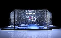 an illuminated display case with the words absolut on it's front and back sides