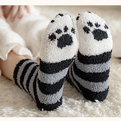 Unleash your inner feline with our Cat Paw Fuzzy Socks! Crafted for comfort and designed for fun, these socks transform your feet into cute cat paws, ensuring every step is filled with whimsy. Made with plush material, they offer unparalleled warmth and coziness, making them a must-have for those chilly days and nights. Whether you're a cat enthusiast or simply in search of unique, comfy socks, these are the purr-fect choice! Features: Material: Plush, fuzzy material for maximum warmth and comfo Cat Paw Socks, Paws Socks, Comfy Socks, Paw Design, Cat Socks, Forest Cat, 2023 Trends, Fuzzy Socks, Cat Claws