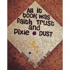 a graduation cap that reads, all it took was faith trust and pixie dust