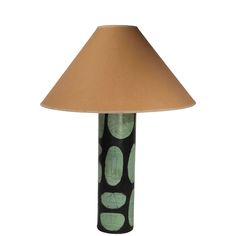 Unusual Mid Century table lamp having a cylindrical body with an dark brown ground, having black lines which frame stylized oval green medallions, with black line drawings of faces.  The body is cardboard, the base and  top are  metal. This example is in good, original, clean and working condition, showing some light cosmetic wear, normal and consistent with age. The lamp accepts a standard size screw in bulb, shade is not included.   Total H 26.5": x H to top of cylinder form body 20" x Dia. 5" Drawings Of Faces, Character Table, Face C, Mid Century Table Lamp, Mid Century Table, Line Drawings, Black Lines, Face Drawing, Line Drawing