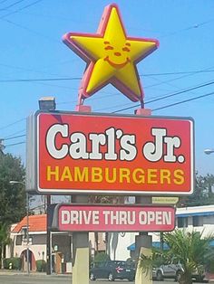 the sign for caris jr's hamburgers is shown