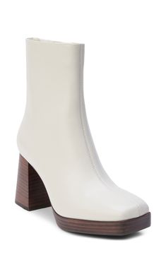 A chunky stacked platform and flared heel lend modern charm to this svelte faux-leather bootie designed with a sharp square toe and handy side zip. 3 1/4" platform 7" shaft; 10 1/2" calf circumference Cushioned footbed Synthetic upper/textile lining/synthetic sole Imported Chic Platform Boots With Block Heel And Zipper, Chic Platform Boots With Block Heel And Zipper Closure, Modern Faux Leather Boots With Block Heel, Modern Faux Leather Heeled Boots With Block Heel, Modern Faux Leather Platform Boots For Spring, Modern Faux Leather Platform Boots, Spring Platform Boots With Sculpted Heel And Square Toe, Chic Platform Boots With Padded Ankle And Block Heel, Spring Square Toe Platform Boots With Sculpted Heel