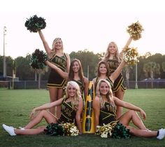 the cheerleaders are posing for a photo together